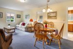 Living and dining areas at Cozy Cottage